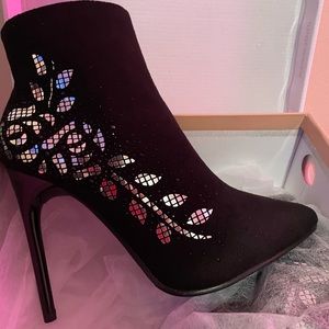 New in the box black ankle boot